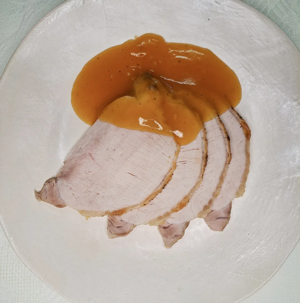 Cinta de Lomo con Salsa de Naranja